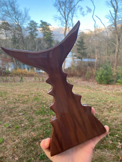 Tails up bottle opener